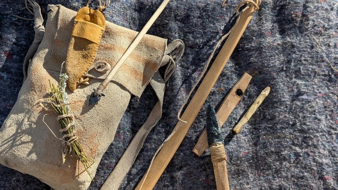 Primitive survival tools and leather gear